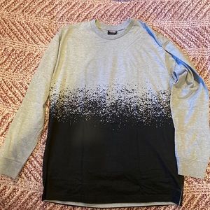 gray and black graphic long sleeve tshirt